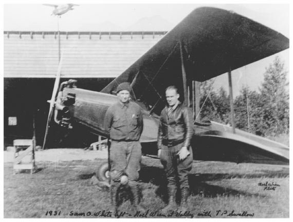 Image: Sam White (left), Noel Wien, and White’s TP Swallow, Valdez, 1931. Noel Wien coll. 60-959-35, University of Alaska Fairbanks, Alaska and Polar Regions Archives. White learned to fly in 1928 and pioneered airborne wildlife law enforcement in 1930.