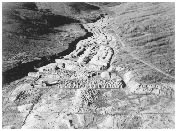 Image: Fairbanks Exploration Co. dredge on Cripple Creek, twelve miles from Fairbanks. Alaska files 8272, University of Washington Archives. Such large-scale operations could permanently alter an entire valley.