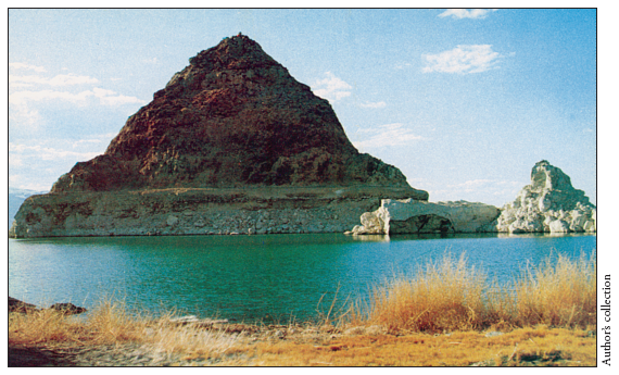 Image: Fig. 8-3. A 1950s-era postcard of Pyramid Lake, Nevada, shows both the pyramid-shaped rock and a light-colored tufa formation some call “the Sphinx.”