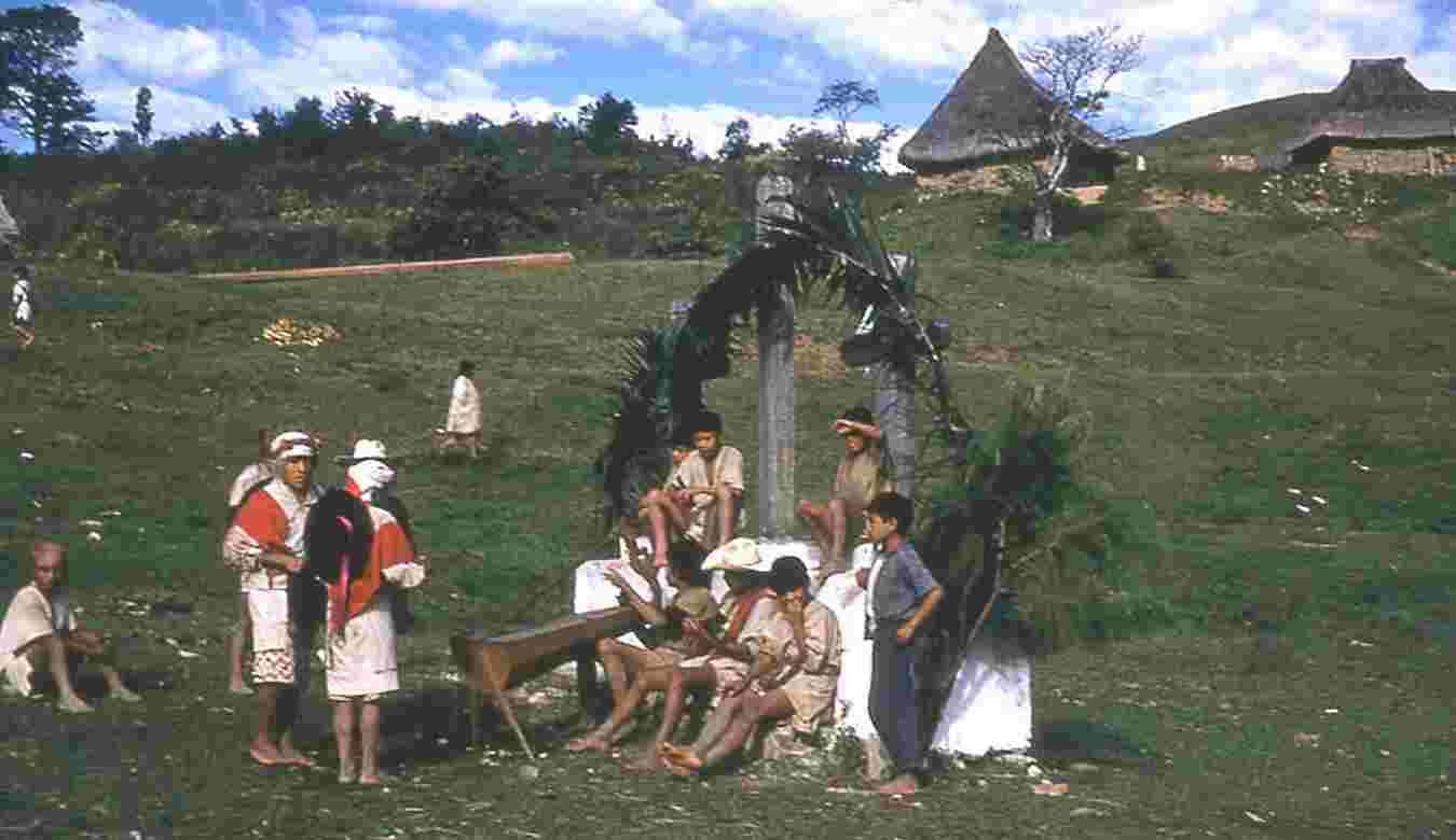 Figure 1.7. Capitanes perform at the crosses in front of the church in the center of downtown San Pablo Chalchihuitán, Chiapas, 1961. Photo by the author.