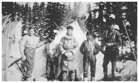 Image: Members of the expedition making first ascent of McKinley’s South Peak, 1913. Denali National Park Archives. Left to right: Robert Tatum, Esais, Henry B. “Harry” Karstens, Johnny, Walter Harper. Absent, probably photographer: Archdeacon Hudson Stuck. Mt. McKinley, later the park’s centerpiece, played no significant role in its designation. Karstens, a former prospector and dog teamer, became the first park superintendent.