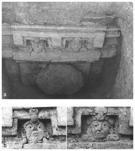 Image: 6.9. Plaster portrait heads on the façade of Tomb 6