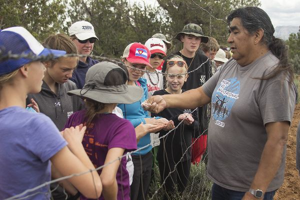 Lee Wayne Lomayestewa, Bear clan, speaking to students at a P-F-P experimental gardens about the importance of maize in Hopi culture